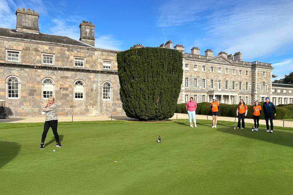 J&J nurse Caroline Thomas taking a swing for Captains Day, Carton House